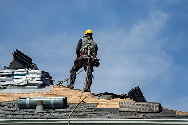 Professional Roof Replacement technician working in Baltic, OH